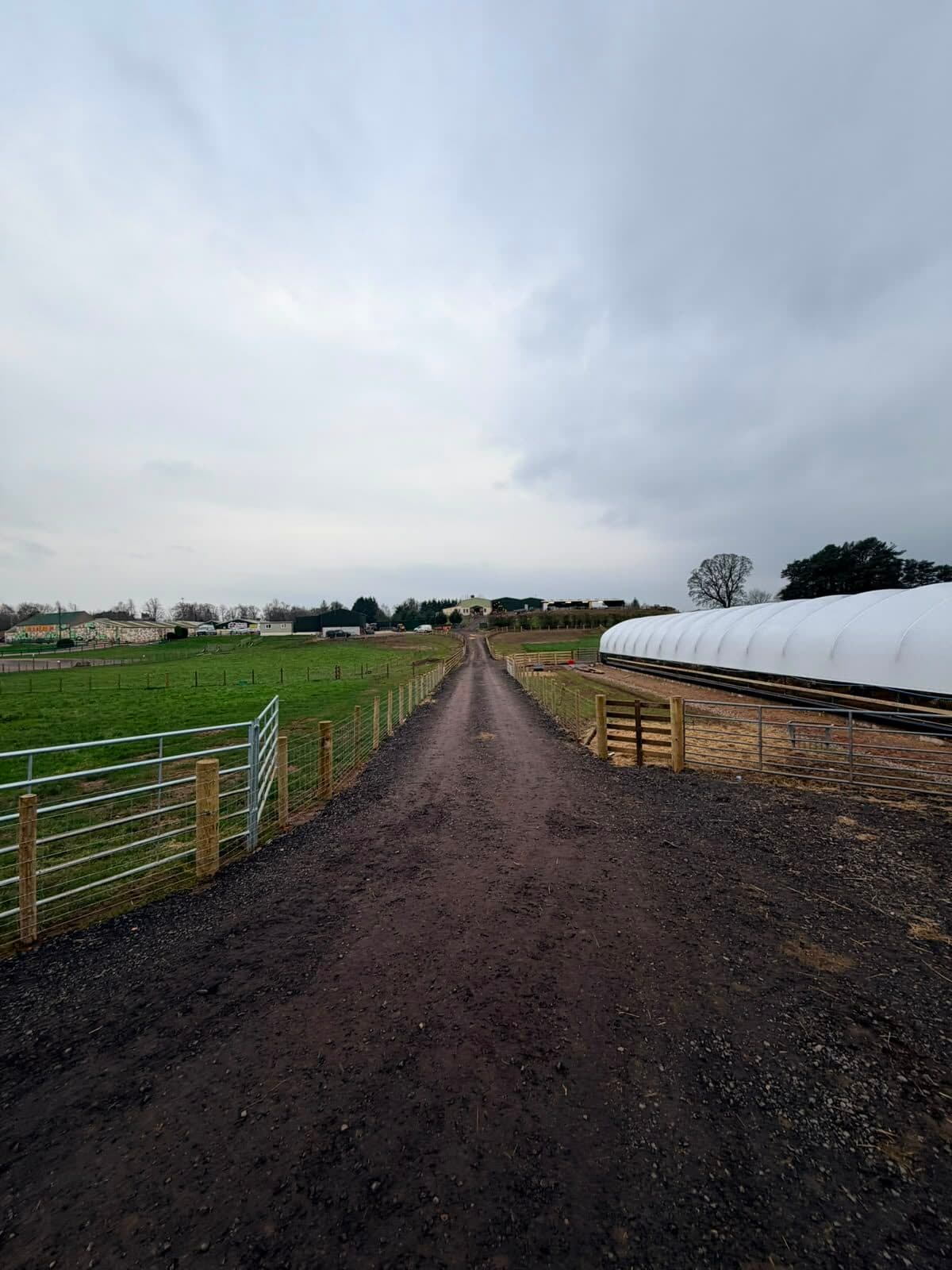 Field gates and fencing along a farm track