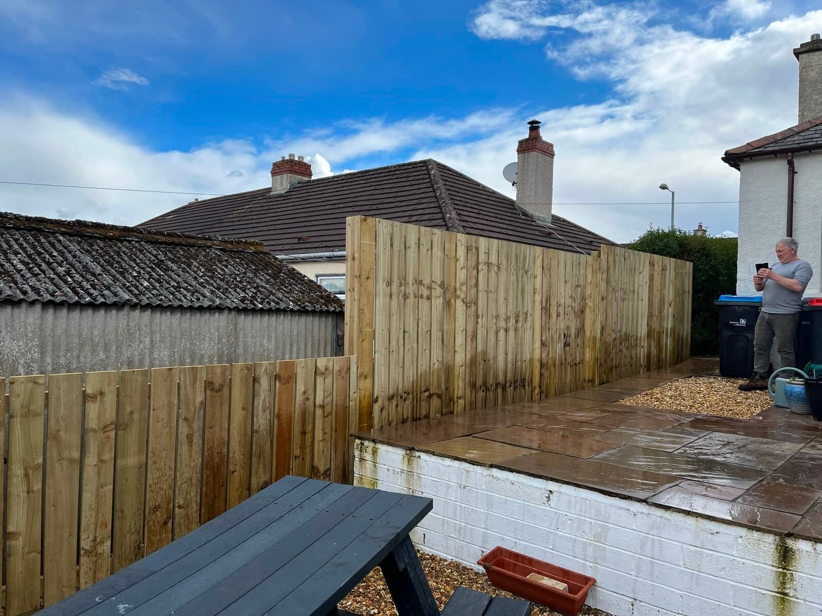 Close-board timber fence along a rear garden boundary