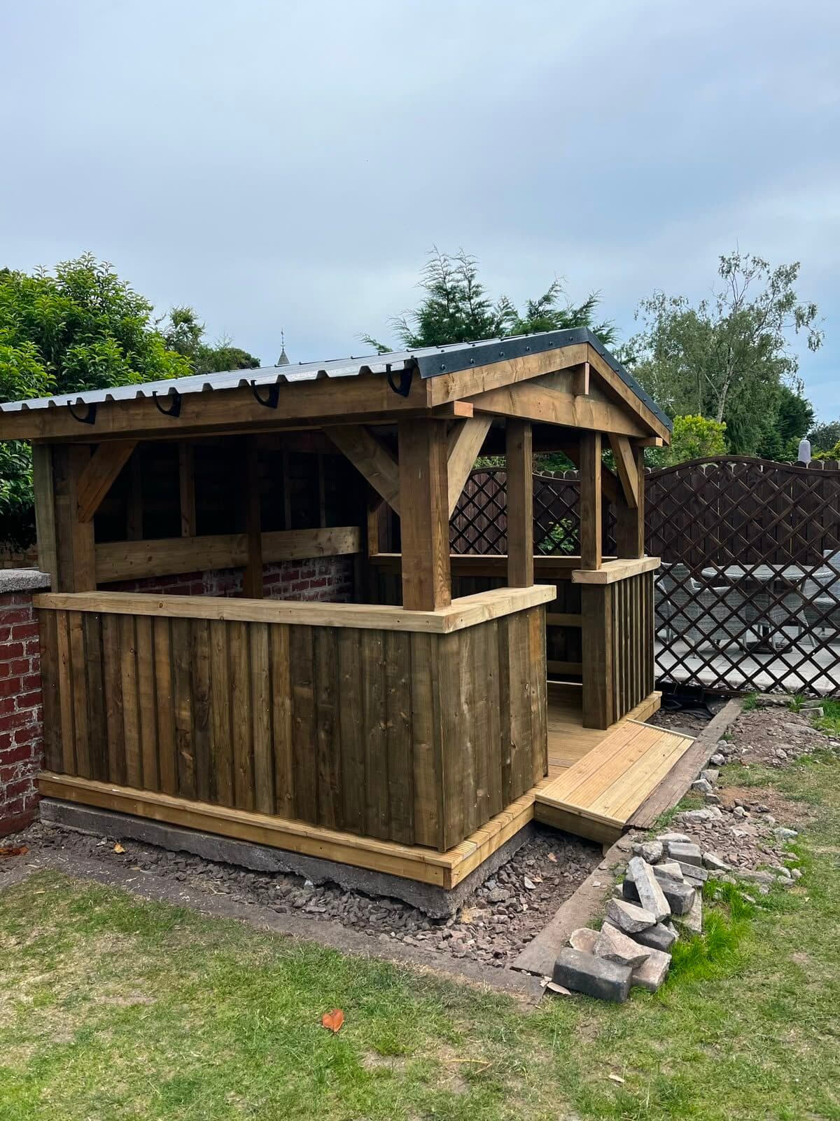 Timber gazebo built as a garden bar and outdoor entertaining space